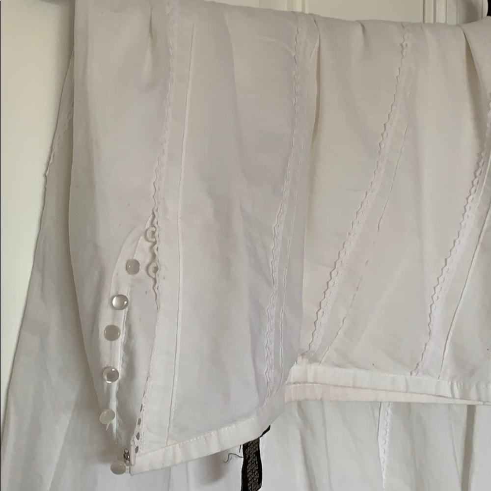 Brand New with no tags. Runs very small. Size 0